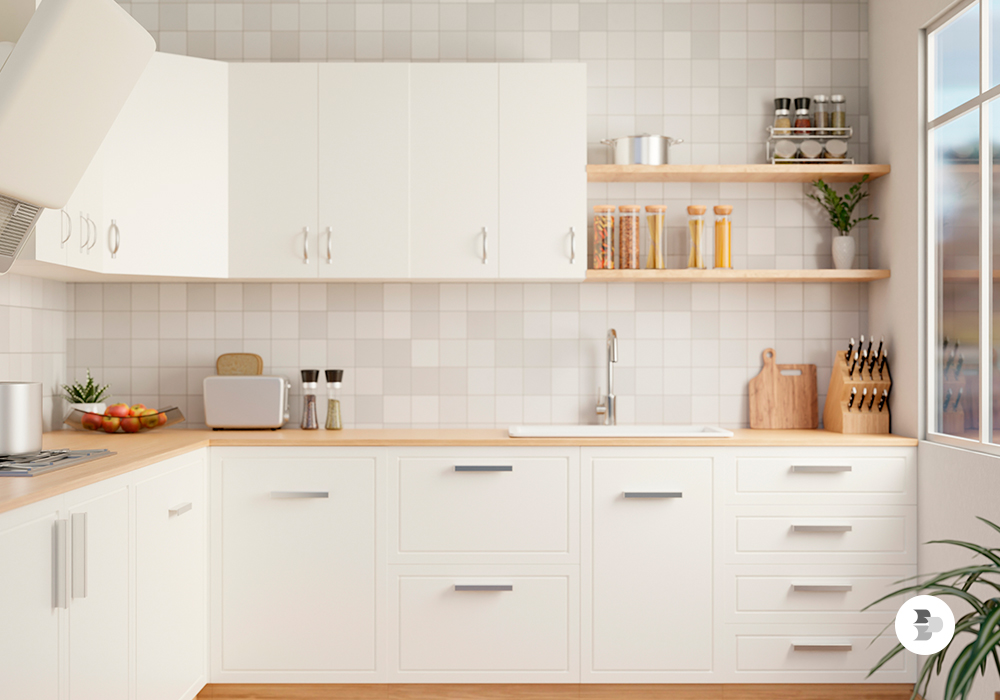 Uma cozinha com balcão, que facilita a rotina. Balcão de cozinha.