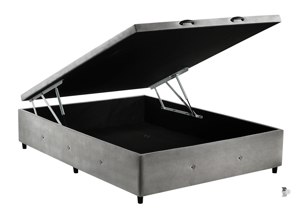 Uma cama box que possui um baú, para armazenamento. Cama box.