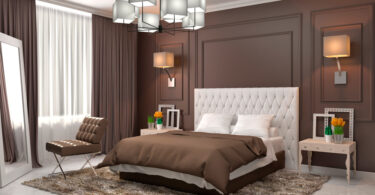 Um quarto com uma cama box. Conjugado Conjunto.